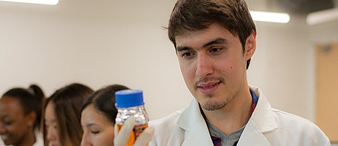 Student Looking At Vials At Miu Lab